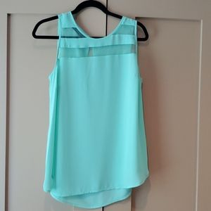 Pale green sleeveless top